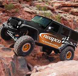 Rock climbing vehicle with Neapco logo